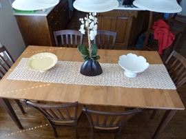 Sharp kitchen table and 6 chairs. Solid wood two tone with one leaf.