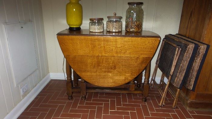 Drop leaf antique table (wicker trays not for sale)
