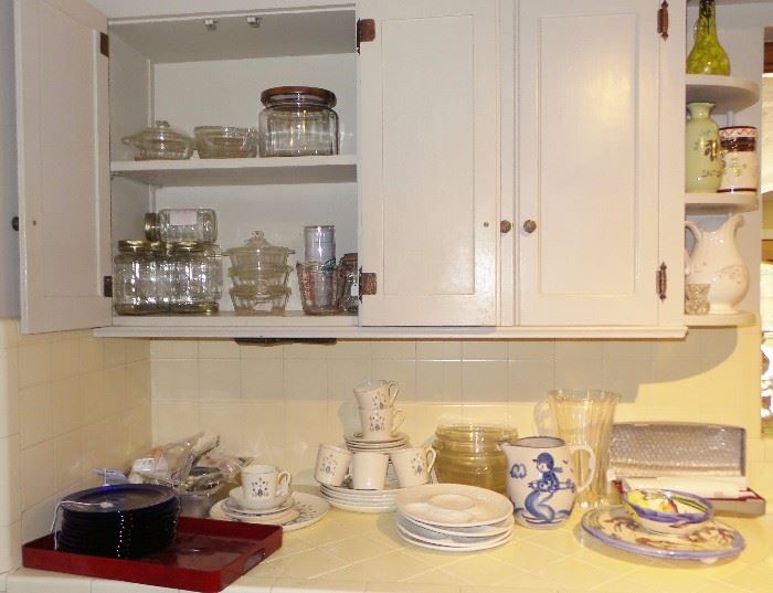 Very full kitchen.  HAdley dish set, entertaining plates and platters, oil and vinegar and spice containers, Ball jars, electric appliances, Staffordshire USA Bone White
Rosenthal green/white Polygon dish set by Tapio Wirkkala Stetson Marcrest Swiss Chalet Alpine Dinnerware 
