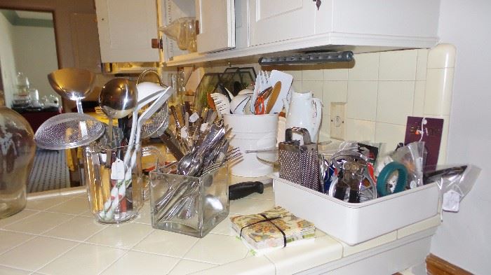 Full kitchen, new to old.  Flatware sets, utensils and gadgets.  Almost every electric appliance