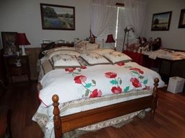 Several quilts and pillows