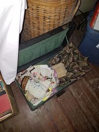 Linens and a couple of vintage suitcases