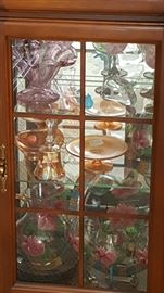 China Cabinet with variety of glass.