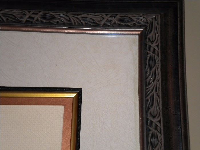 Framed cross stitch lady with 2 cats and gold trim