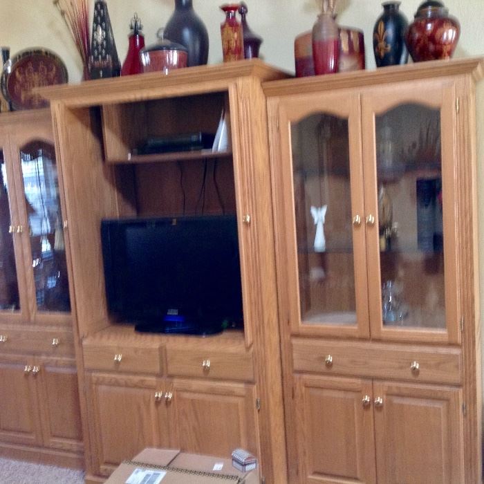 Beautiful Custom Made Oak Entertainment Center/Curio Cabinets.  Three Separate Pieces which can be sold separately.  ALSO Flat Screen TV is for sale.