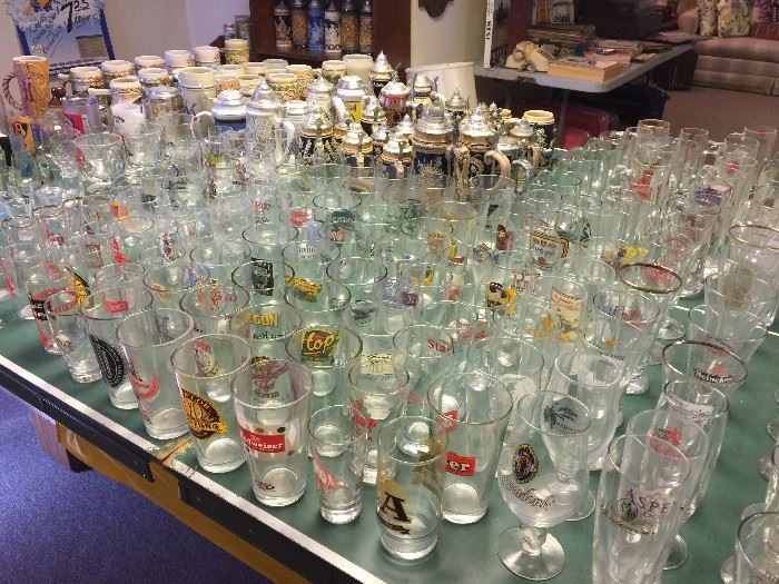 Large selection of vintage and newer beer and bar glasses and pitchers