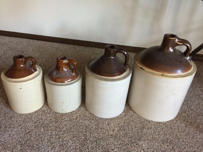 Large selection of antique jugs and crocks