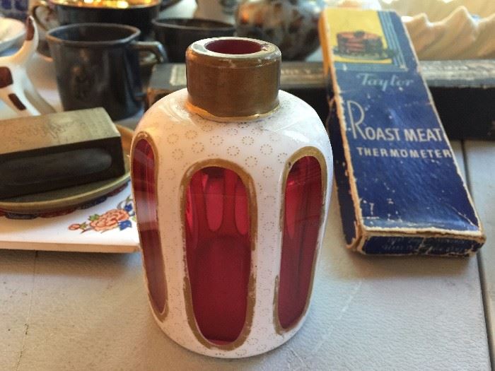 Antique cranberry glass bottle