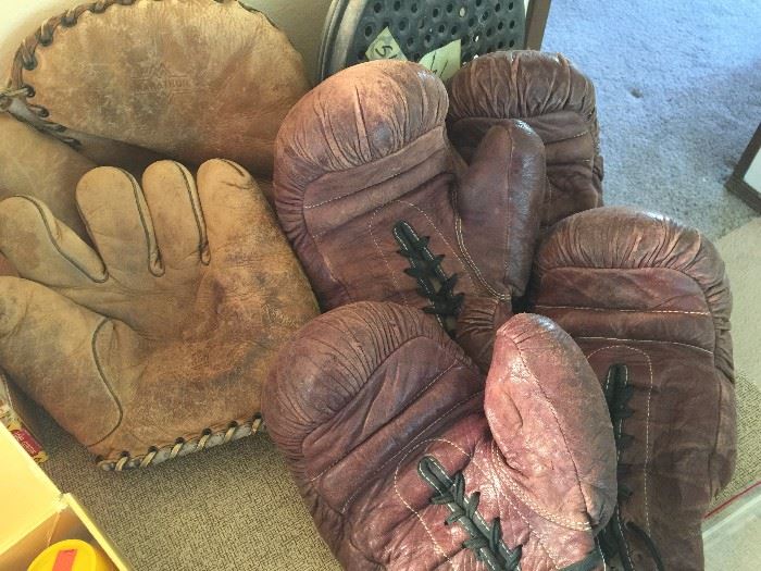 Vintage 1940's boxing gloves and baseball gloves