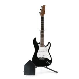 Peter Gabriel Signed Crescent Electric Guitar and CD: A black Strat style Crescent electric guitar, signed to its white pickguard by Peter Gabriel in black marker. Also included is a copy of Peter Gabriel’s 1993 house-shaped CD box set of the “Steam” single. The outer packaging is signed from Gabriel “To Tim” in gold tone marker.