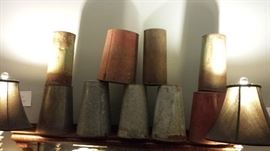Many vintage maple sap buckets