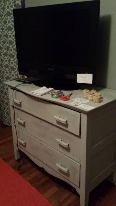 large dresser and television... priced to sell!