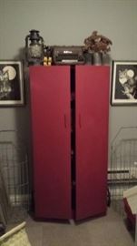 metal storage cabinet, vintage typewriter, vintage prints, old shopping carts, etc.
