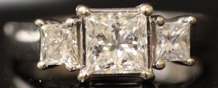 Lot 3027: Lady's Three-Stone Princess Cut Diamond 14KT Ring; size 7 View full catalog at www.slawinski.com