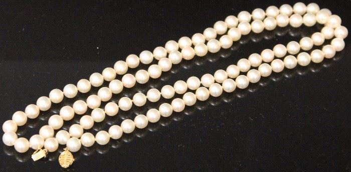 Lot 3054: Lady's Pearl Strand Necklace with 14KT Clasp; 36" View full catalog at www.slawinski.com
