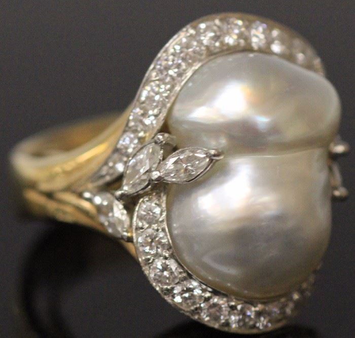 Lot 3181: Diamond and Pearl 18KT Ring; size 6. View full catalog at www.slawinski.com