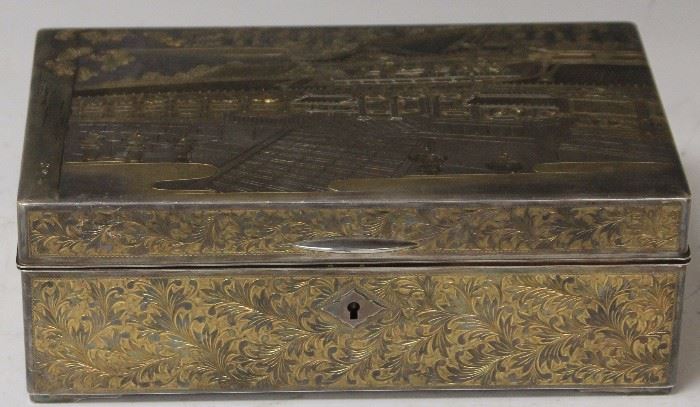 Lot 3147: Silver and Gold Chased Jewelry Box, 19th Century; length- 10 1/4" View full catalog at www.slawinski.com