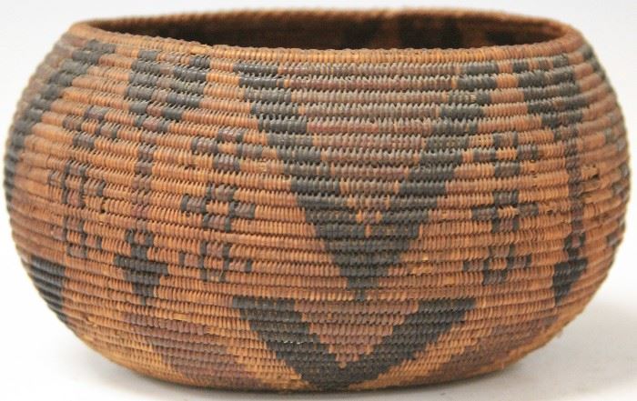 Lot 3163: Early Native American Woven Basket, 7 1/2" length, 4 1/4" height View full catalog at www.slawinski.com