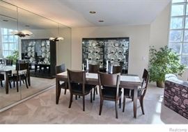 Dining Table with 6 chairs (4 side chairs & 2 captain chairs).  Table measures 82'' L (with leaf) x 40'' W x 29 1/2'' H with, leaf measures 20''.  Chair 20 1/2'' W x 20'' D x 38''H, seat height 17 1/2''.  Black Lacquered Light-up Glass Front Display Cabinet Curio by Ello Furniture.  36 1/4'' W x 17'' D x 75 1/4'' H