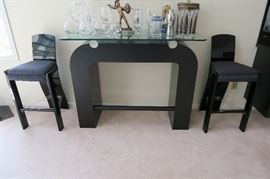 Black Lucite Acrylic Bar Stools 18'' W x 18'' D x 38'' H seat height 28'', Table with glass top also has Lucite acrylic accent 52'' L x 18'' D x 39 1/2'' H