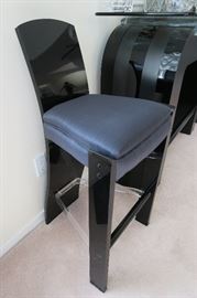 Black Lucite Acrylic Bar Stools 18'' W x 18'' D x 38'' H seat height 28'', Table with glass top also has Lucite acrylic accent 52'' L x 18'' D x 39 1/2'' H