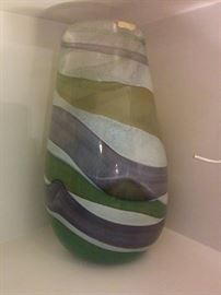 Decorative vase with amethyst, green, and white swaths in heavy body