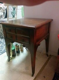 Small occasional table with drawers
