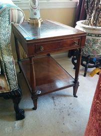 Traditional sofa table with leather top