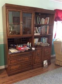 Two pieces - sold separately or together - Bookcase with storage underneath and glass door cabinet with desk area and drawers!