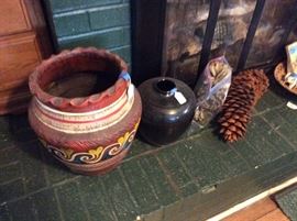 Mexican pottery pieces, large pinecones.