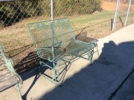 The one armed wrought iron rocker - - but hey now your feet can dangle... it's a great pieces