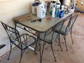 VINTAGE VINTAGE VINTAGE - Glass Top table - and 6 chairs - one chair is missing the cushion - wrought iron is gorgeous - very nice set - best I have seen in a long time!