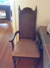 Here is the caned arm chair...