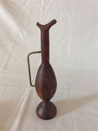 Wood vase constructed with three varieties of wood: Black Walnut, Choke Cherry, and Cedar. 