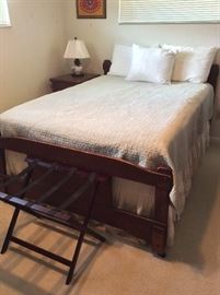 Full size bed with head board and foot board. 