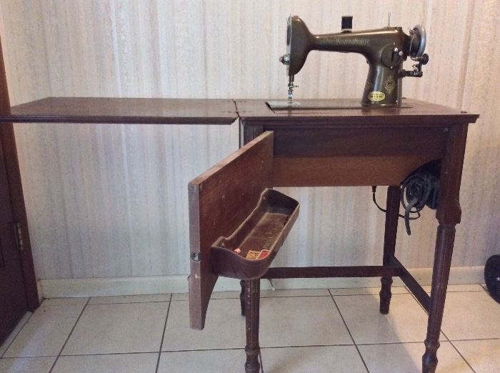 Free Westinghouse Electric Sewing Machine with cabinet. 