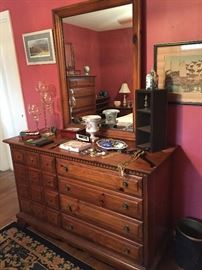 Double Dresser and Mirror which is part of bedroom suite ensemble.