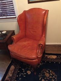 Terra Cotta colored leather arm chair