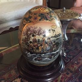 Satsuma decorated large egg on wooden base