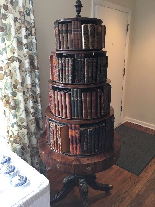 Rare multi-tiered revolving bookcase.
