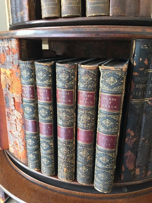 Many volumes of antique books.