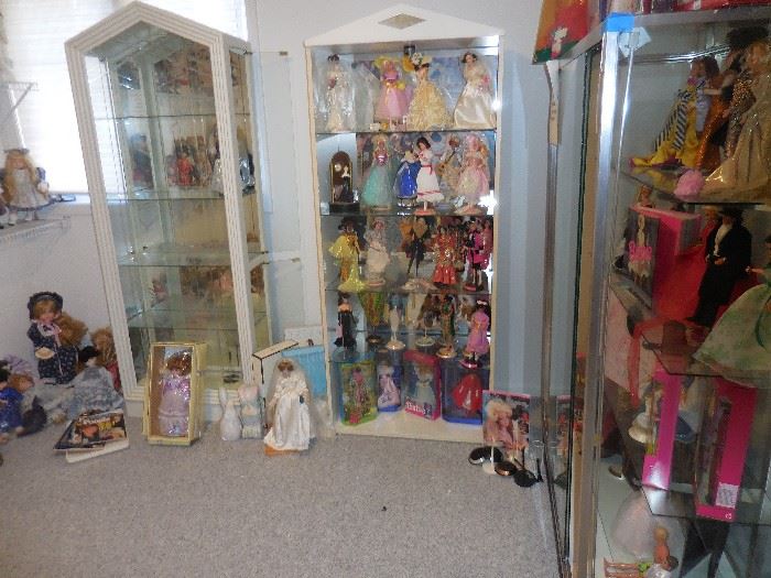 Barbie Dolls in Lighted Cabinet 