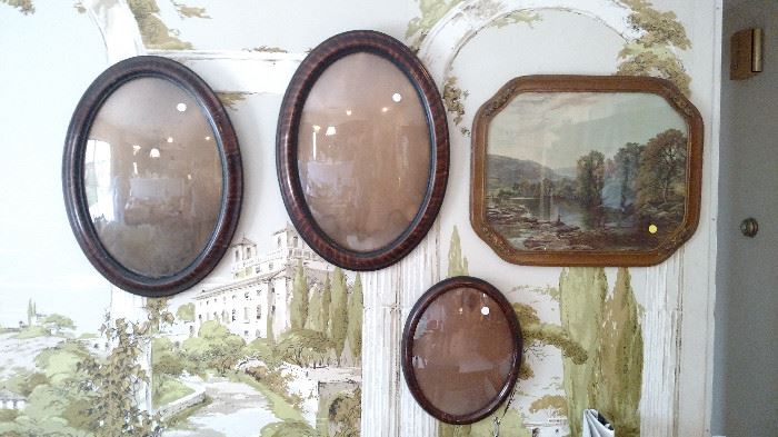 Vintage oval frames with curved glass