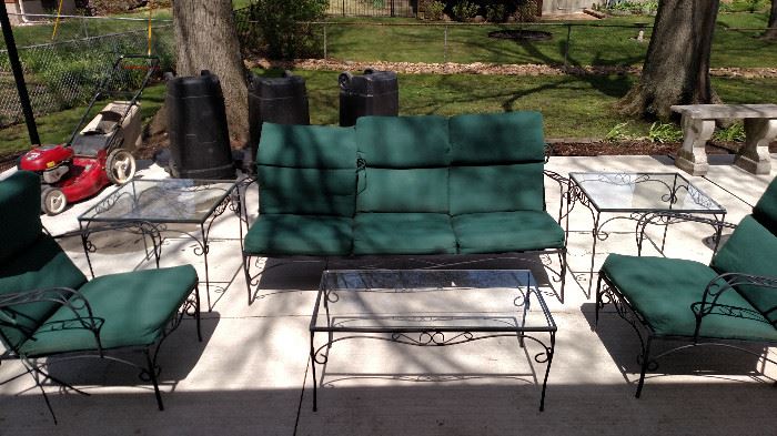 Black Rod Iron patio set with cushions and glass tops