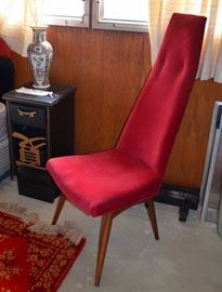 Red chair in the style of Pearsall