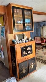 Built in bar with oriental panels.