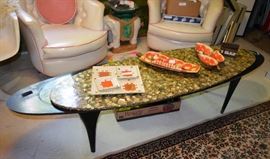 mid century table with oval abalone piece on top