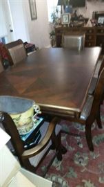 Table with 6 chairs and extra Leaf (New)