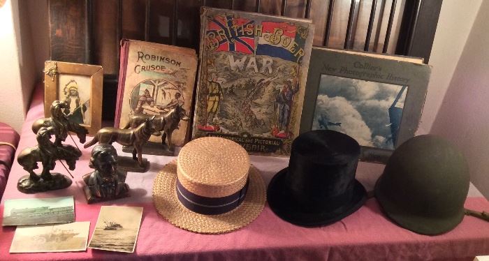 Figural book ends, a few photo postcards, vintage straw boater, old top hat, WW II M-1 metal helmet with liner, and just a few of the MANY MANY books