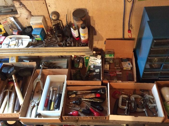 More hand tools: hammers, rubber mallets, sockets, screwdrivers, clamps, assorted hardware & hose repair stuff